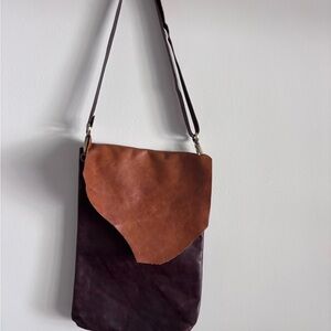 Large Leather two-toned crossbody/messenger bag. Adjustable strap.